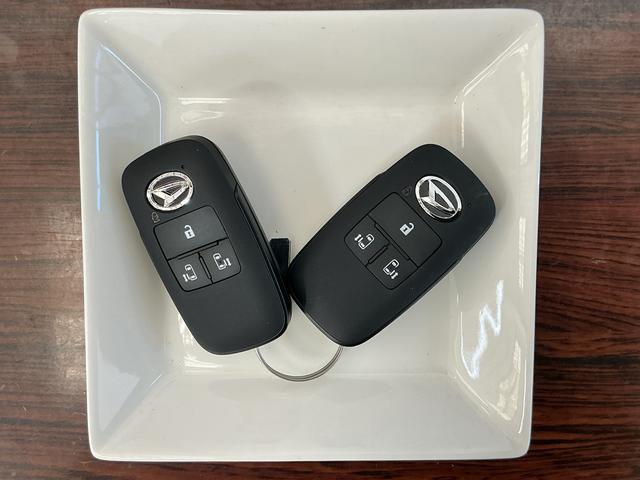 タントカスタムX 届出済み未使用車 パノラマモニター 電動スライド届出済み未使用車 パノラマモニター 両側電動スライドドア 前席シートヒーター 前後コーナーセンサー 電子パーキング オートブレーキホールド オートマチックハイビーム 14インチ純正アルミホイール(京都府)の中古車