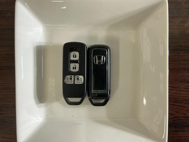 N−BOXG・Lホンダセンシング ワンオーナー ナビ バックカメラワンオーナー ナビ バックカメラ ETC 両側電動スライドドア アダプティブクルーズコントロール Bluetooth USB接続 DVD再生 フルセグTV LEDヘッドライト 横滑り防止装置(京都府)の中古車