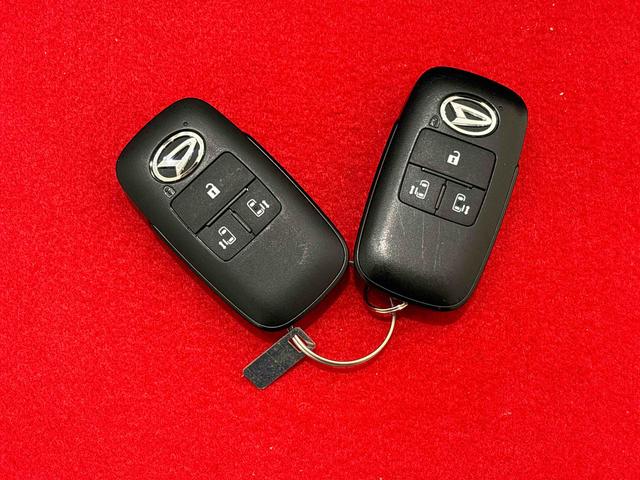 ムーヴキャンバスストライプスＧターボＬＥＤオートライト・フォグランプ　電動パーキングブレーキ　プッシュボタンスタート　セキュリティアラーム　バックカメラ　両側パワースライドドアウエルカムオープン機能　オート電動格納式ドアミラー（広島県）の中古車