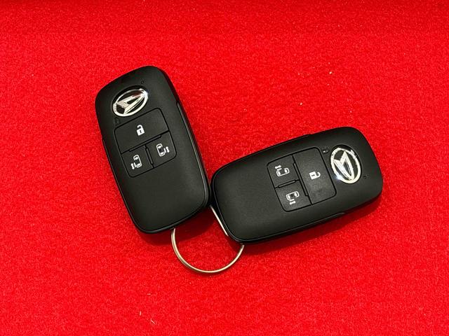 ムーヴキャンバスストライプスＧ　ナビゲーション　シートヒーターＬＥＤオートライト・フォグランプ　電動パーキングブレーキ　プッシュボタンスタート　セキュリティアラーム　バックカメラ　両側パワースライドドアウエルカムオープン機能　オート電動格納式ドアミラー（広島県）の中古車