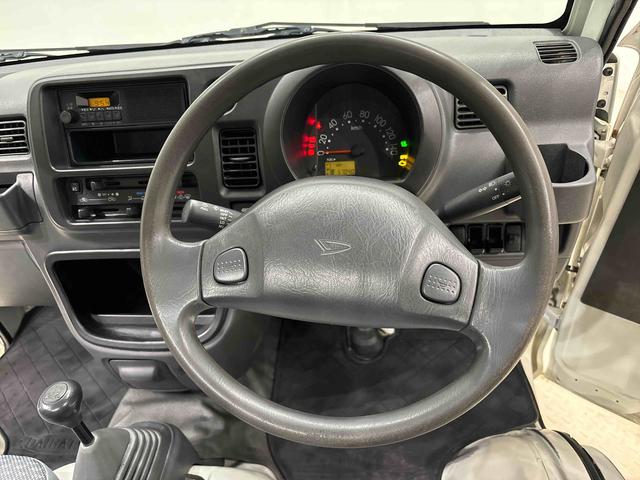 ハイゼットトラックエアコン・パワステ　スペシャル４ＷＤ　マニュアル　マニュアルエアコン　パワーステアリング　ヘッドライトレベリング　バイザー　スペアタイヤ　ガードフレームＡＭＦＭラジオ（広島県）の中古車
