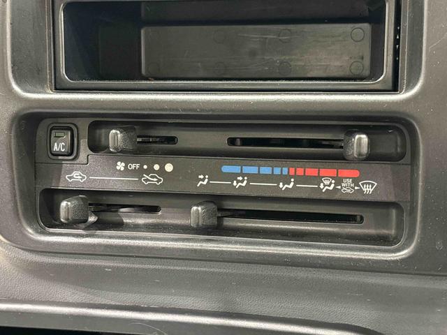 ハイゼットトラックエアコン・パワステ　スペシャル４ＷＤ　マニュアル　マニュアルエアコン　パワーステアリング　ヘッドライトレベリング　バイザー　スペアタイヤ　ガードフレームＡＭＦＭラジオ（広島県）の中古車