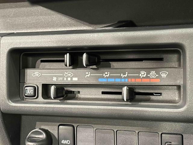 ハイゼットトラックスタンダード マニュアルレベリング機能付ハロゲンヘッドランプハロゲンフォグランプ AM・FMラジオ マニュアルエアコン ガードフレーム スペアタイヤ バッテリーカバー パートタイム4WD マルチユーティリティーフック ドリンクホルダー(広島県)の中古車