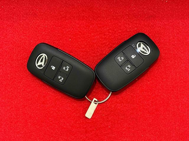 ムーヴキャンバスストライプスGターボ 全車速追従機能付ACC純正ナビ装着用アップグレードパック 運転席・助手席シートヒーター 両側電動スライドドア 電動パーキングブレーキ オートブレーキホールド機能 運転席シートリフター チルトステアリング キーフリーシステム(広島県)の中古車