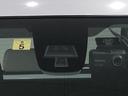 電動格納式ドアミラー　ミラー付きサンバイザー　運転席シートリフター　センターアームレスト　ショツピングフック　ハイマウントストップランプ　セキュリティアラーム　キーレスエントリー　フルホイールキャツプ（広島県）の中古車