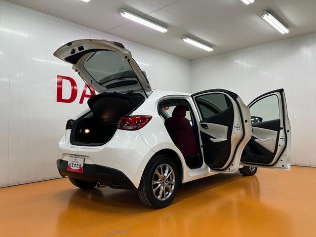 デミオ15Sノーブルクリムゾン衝突被害軽減ブレーキシステム ドラレコ 全周囲カメラ クルーズコントロール ステアリングスイッチ シートヒーター USB接続端子 ヘッドアップディスプレイ ETC コーナーセンサー キーフリー(神奈川県)の中古車