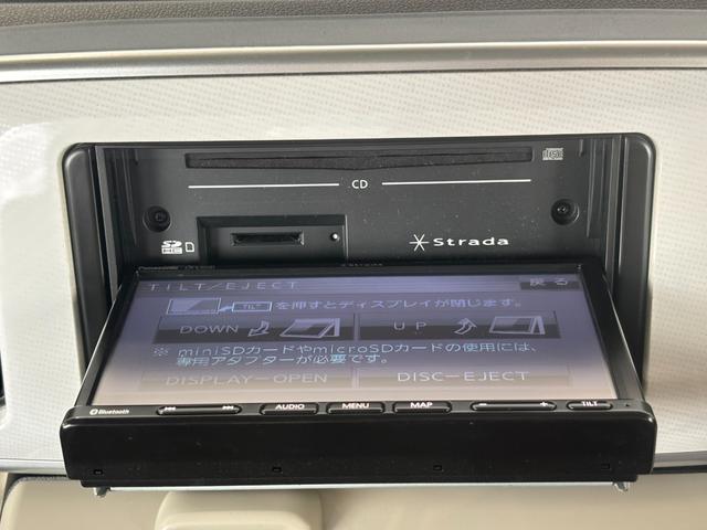 ムーヴキャンバス 中古車 Ｘ　ＳＡＩＩＩナビゲーション　バックカメラ　ＥＴＣ車載器　プッシュスタートスイッチ　キーフリーシステム　両側電動スライドドア　電動格納式ドアミラー　パワーウィンドウ　アイドリングストップ機能