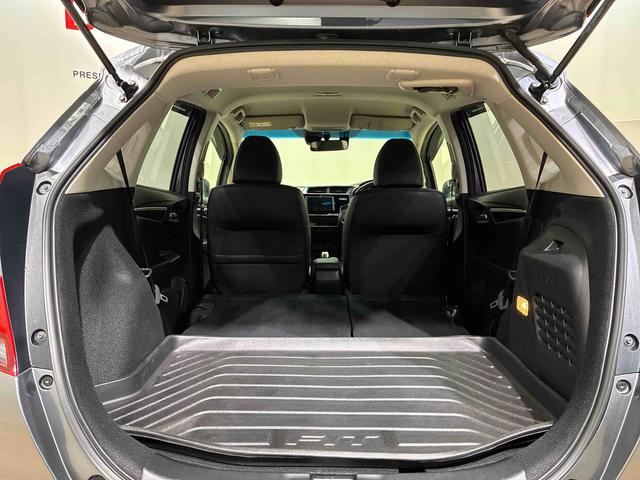 フィットハイブリッドＬ　ホンダセンシング４ＷＤ　ＥＴＣ　アルミホイール　ＬＥＤヘッドランプ　スマートキー　記録簿　禁煙車　エアバッグ　エアコン　パワーステアリング　パワーウィンドウ　ＡＢＳ（北海道）の中古車