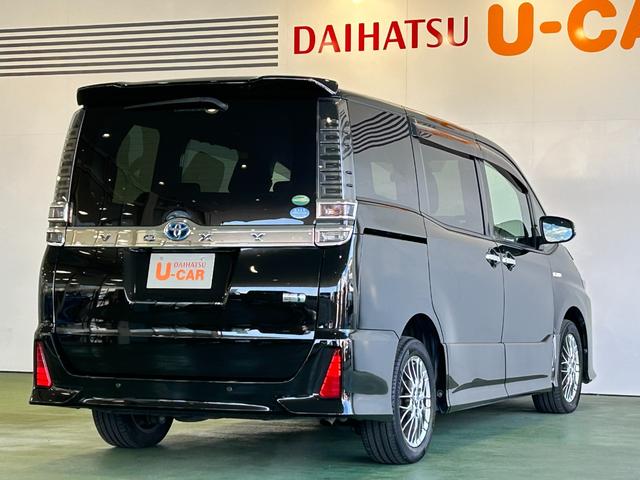 ヴォクシーハイブリッドZS 煌IIナビ ETC プッシュボタンスタ−ト 衝突被害軽減ブレーキ 両側電動スライドドア シ−トヒ−タ− バックカメラ 3列シ−ト ハイブリッド LEDヘッドライト(奈良県)の中古車