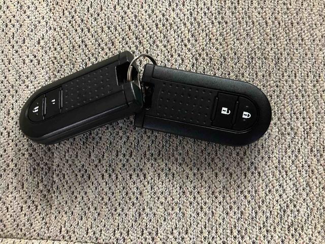 ムーヴキャンバスＸＣＤチューナー付き　後席両側スライドドア　アイドリングストップ　オートライト　キーフリーシステム　電動格納ドアミラー　２トーンカラー　オートエアコン　プッシュボタンスタート　マニュアルレベリング機能（鳥取県）の中古車