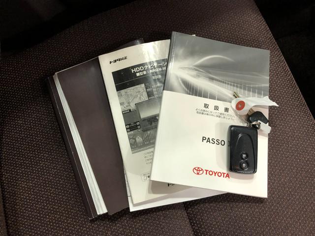 パッソプラスハナ　雹害／走行距離６７０７７キロ／ワンセグナビ１年保証距離無制限　走行距離６７０７７キロ　ワンセグナビ　バックカメラ　ブルートゥース　純正カーペットマット　助手席エアバッグ　オートエアコン（埼玉県）の中古車