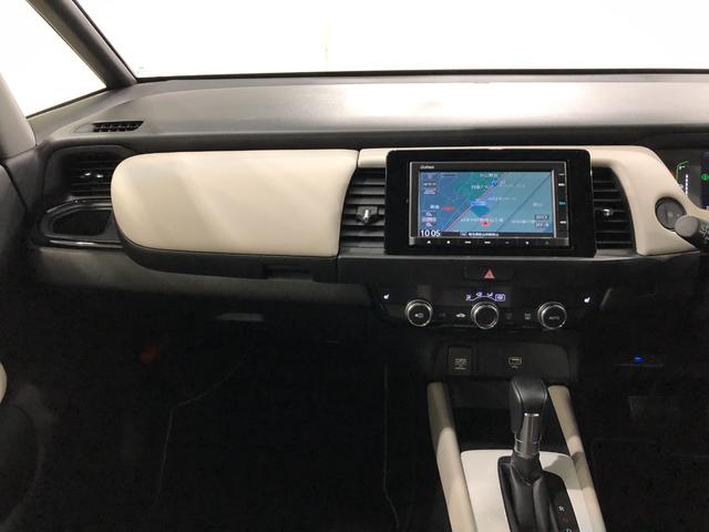 フィットｅ：ＨＥＶホーム　２０周年特別仕様車　メゾン　車検整備付１年保証距離無制限　走行距離１８４６３キロ　ＴＶレスナビ　バックカメラ　ブルートゥース　純正マット　サイドエアバッグ　クリアランスソナー　ＬＥＤヘッドランプ　シートヒーター　電動パーキングブレーキ（埼玉県）の中古車