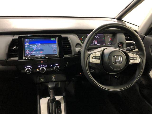 フィットｅ：ＨＥＶホーム　走行９９４３キロ／ナビ／バックカメラ１年保証距離無制限　走行距離９９４３キロ　フルセグナビ　バックカメラ　ブルートゥース　ＵＳＢ２口　純正マット　サイドエアバッグ　オートライト　ＬＥＤヘッドランプ　電動格納式ドアミラー　キーフリー（埼玉県）の中古車