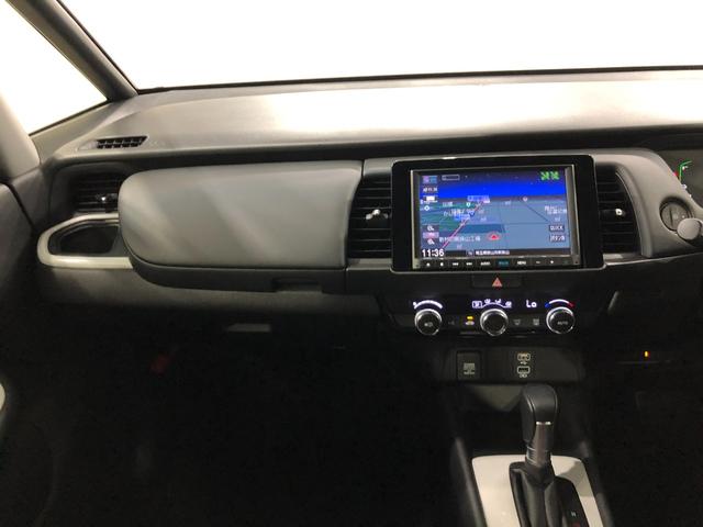 フィットｅ：ＨＥＶホーム　走行９９４３キロ／ナビ／バックカメラ１年保証距離無制限　走行距離９９４３キロ　フルセグナビ　バックカメラ　ブルートゥース　ＵＳＢ２口　純正マット　サイドエアバッグ　オートライト　ＬＥＤヘッドランプ　電動格納式ドアミラー　キーフリー（埼玉県）の中古車