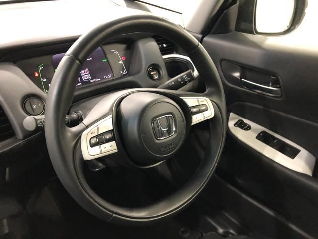 フィットｅ：ＨＥＶホーム　走行９９４３キロ／ナビ／バックカメラ１年保証距離無制限　走行距離９９４３キロ　フルセグナビ　バックカメラ　ブルートゥース　ＵＳＢ２口　純正マット　サイドエアバッグ　オートライト　ＬＥＤヘッドランプ　電動格納式ドアミラー　キーフリー（埼玉県）の中古車