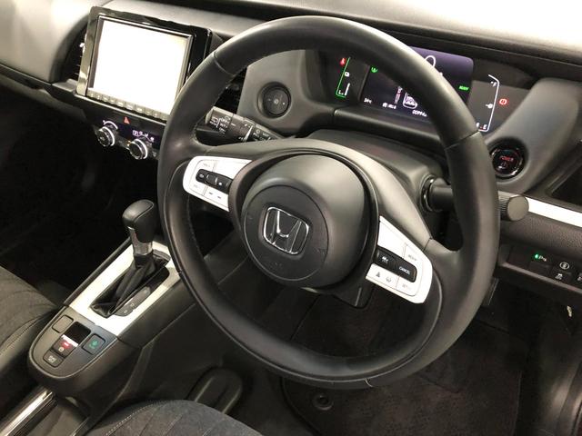 フィットｅ：ＨＥＶホーム　走行９９４３キロ／ナビ／バックカメラ１年保証距離無制限　走行距離９９４３キロ　フルセグナビ　バックカメラ　ブルートゥース　ＵＳＢ２口　純正マット　サイドエアバッグ　オートライト　ＬＥＤヘッドランプ　電動格納式ドアミラー　キーフリー（埼玉県）の中古車