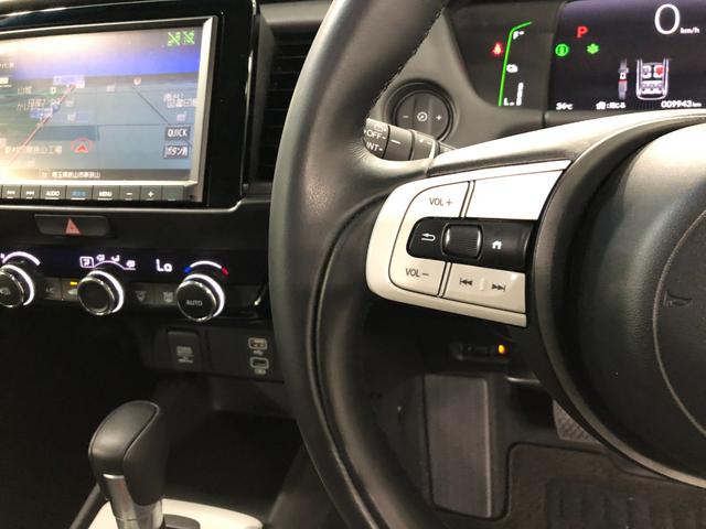 フィットｅ：ＨＥＶホーム　走行９９４３キロ／ナビ／バックカメラ１年保証距離無制限　走行距離９９４３キロ　フルセグナビ　バックカメラ　ブルートゥース　ＵＳＢ２口　純正マット　サイドエアバッグ　オートライト　ＬＥＤヘッドランプ　電動格納式ドアミラー　キーフリー（埼玉県）の中古車