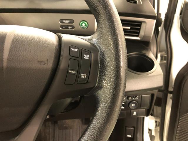 フリードＧ　プレミアムエディション　走行５１００５キロ／ワンセグナビ１年保証距離無制限　走行距離５１００５キロ　ワンセグナビ　バックカメラ　ブルートゥース　純正マット　オートライト　ＨＩＤヘッドランプ　両側スライドドア　電動格納式ドアミラー（埼玉県）の中古車