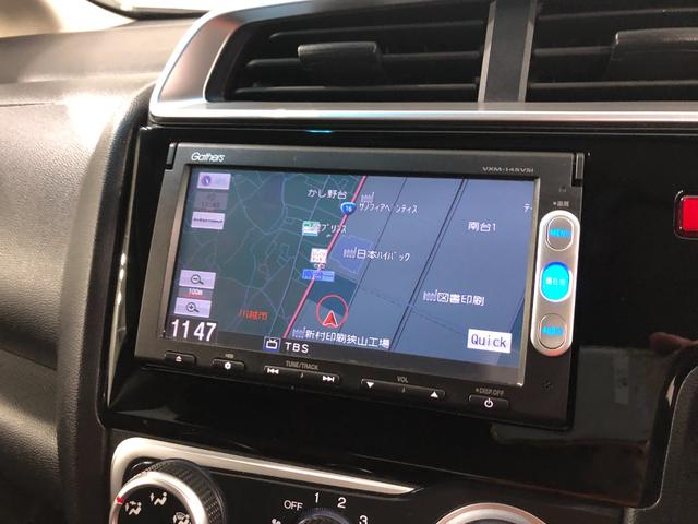 フィット１３Ｇ・Ｆパッケージ　走行３１３５５キロ／雹害／ナビ／ＥＴＣ一年保証・走行距離無制限　走行３１３５５キロ　ワンセグナビ　バックカメラ　ブルートゥース　ＤＶＤ　助手席エアバック　純正カーペットマット（埼玉県）の中古車