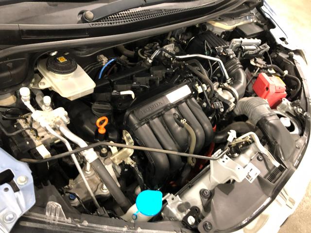 フィットハイブリッドFパッケージ 走行52471キロ/ワンセグナビ/バックカメラ1年保証距離無制限 走行距離52471キロ ワンセグナビ バックカメラ ブルートゥース 純正マット サイドエアバッグ 電動格納式ドアミラー プッシュスタート(埼玉県)の中古車