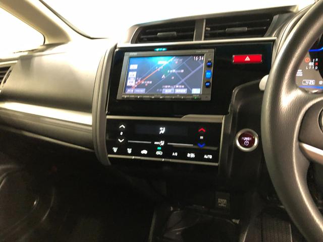 フィットハイブリッドFパッケージ 走行52471キロ/ワンセグナビ/バックカメラ1年保証距離無制限 走行距離52471キロ ワンセグナビ バックカメラ ブルートゥース 純正マット サイドエアバッグ 電動格納式ドアミラー プッシュスタート(埼玉県)の中古車