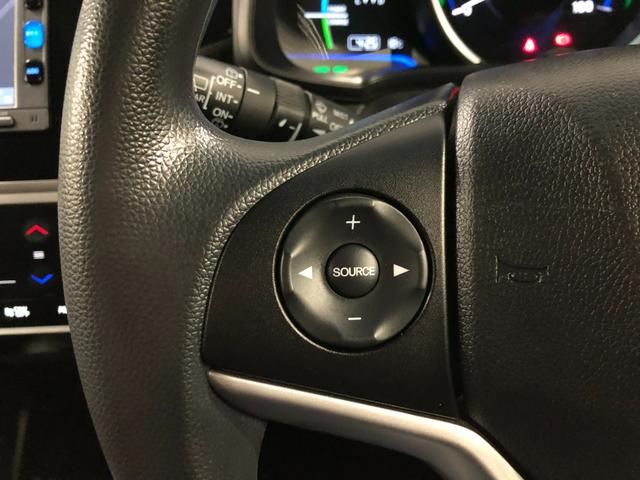 フィットハイブリッドFパッケージ 走行52471キロ/ワンセグナビ/バックカメラ1年保証距離無制限 走行距離52471キロ ワンセグナビ バックカメラ ブルートゥース 純正マット サイドエアバッグ 電動格納式ドアミラー プッシュスタート(埼玉県)の中古車