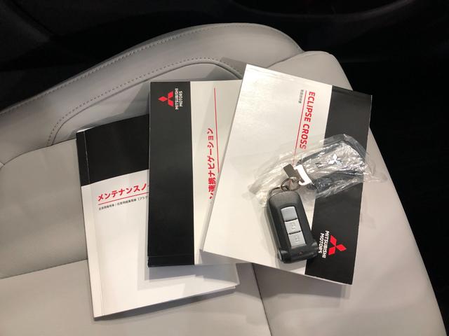 エクリプスクロスPHEVP 走行8998キロ/4WD/ナビ/全周囲カメラ/ETC一年保証・走行距離無制限 走行8998キロ フルセグナビ ブルートゥース 全周囲カメラ サイドエアバック クリアランスソナー オートライト LEDヘッドライト シートヒーター(埼玉県)の中古車