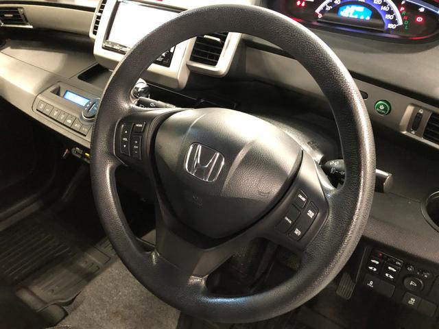 フリードＧ　プレミアムエディション　走行６４９３６キロ／フルセグナビ１年保証距離無制限　走行距離６４９３６キロ　フルセグナビ　ブルートゥース　純正マット　オートライト　ＨＩＤヘッドランプ　両側電動スライドドア（埼玉県）の中古車