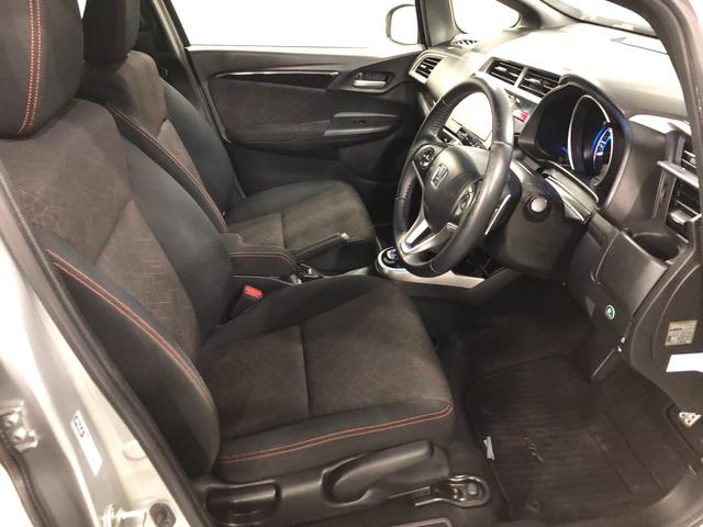 フィットハイブリッドＳパッケージ　走行７０２５２キロ／ナビ／バックカメラ一年保証・走行距離無制限走行７０２５２キロ　ワンセグナビ　ＥＴＣ　バックカメラ　ブルートゥース　オートライト　ＬＥＤヘッドライト（埼玉県）の中古車