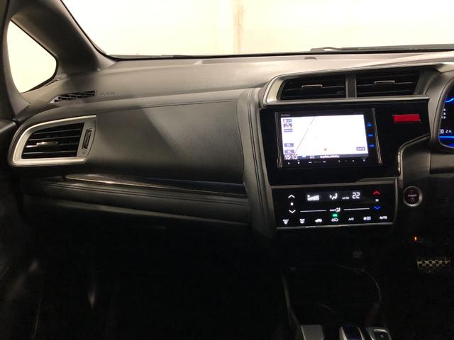 フィットハイブリッドＳパッケージ　走行７０２５２キロ／ナビ／バックカメラ一年保証・走行距離無制限走行７０２５２キロ　ワンセグナビ　ＥＴＣ　バックカメラ　ブルートゥース　オートライト　ＬＥＤヘッドライト（埼玉県）の中古車