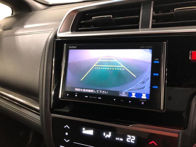 フィットハイブリッドＳパッケージ　走行７０２５２キロ／ナビ／バックカメラ一年保証・走行距離無制限走行７０２５２キロ　ワンセグナビ　ＥＴＣ　バックカメラ　ブルートゥース　オートライト　ＬＥＤヘッドライト（埼玉県）の中古車