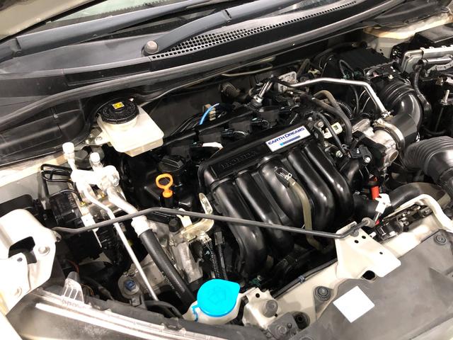 フィットハイブリッドＳパッケージ　走行７０２５２キロ／ナビ／バックカメラ一年保証・走行距離無制限走行７０２５２キロ　ワンセグナビ　ＥＴＣ　バックカメラ　ブルートゥース　オートライト　ＬＥＤヘッドライト（埼玉県）の中古車