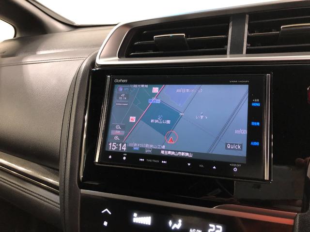 フィットハイブリッドＳパッケージ　走行７０２５２キロ／ナビ／バックカメラ一年保証・走行距離無制限走行７０２５２キロ　ワンセグナビ　ＥＴＣ　バックカメラ　ブルートゥース　オートライト　ＬＥＤヘッドライト（埼玉県）の中古車