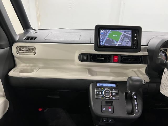 ムーヴキャンバスストライプスＧ　走行８７５６キロ／車検整備付／純正ナビ一年保証・走行距離無制限走行８７５６キロ　フルセグナビ　バックカメラ　ブルートゥース　クリアランスソナー　　オートライト　ＬＥＤヘッドライト　ベンチシート　シートヒーター　両側電動スライドドア（埼玉県）の中古車