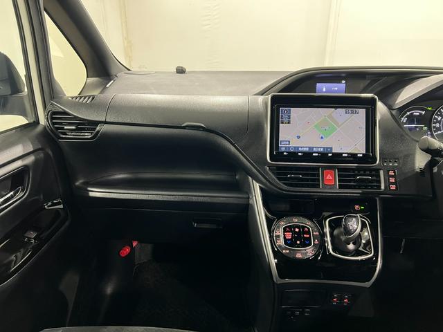 ヴォクシーハイブリッドZS 煌III 車検整備付/走行56029キロ1年保証距離無制限 走行距離56029キロ フルセグナビ バックカメラ ブルートゥース ドラレコ 純正マット 助手席エアバッグ LEDヘッドランプ 両側電動スライドドア 電動格納式ドアミラー(埼玉県)の中古車