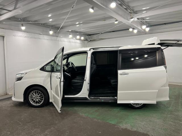 ヴォクシーハイブリッドZS 煌III 車検整備付/走行56029キロ1年保証距離無制限 走行距離56029キロ フルセグナビ バックカメラ ブルートゥース ドラレコ 純正マット 助手席エアバッグ LEDヘッドランプ 両側電動スライドドア 電動格納式ドアミラー(埼玉県)の中古車