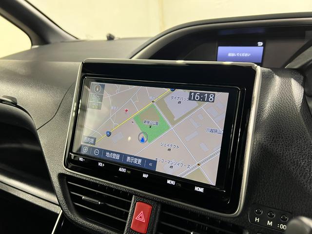 ヴォクシーハイブリッドZS 煌III 車検整備付/走行56029キロ1年保証距離無制限 走行距離56029キロ フルセグナビ バックカメラ ブルートゥース ドラレコ 純正マット 助手席エアバッグ LEDヘッドランプ 両側電動スライドドア 電動格納式ドアミラー(埼玉県)の中古車