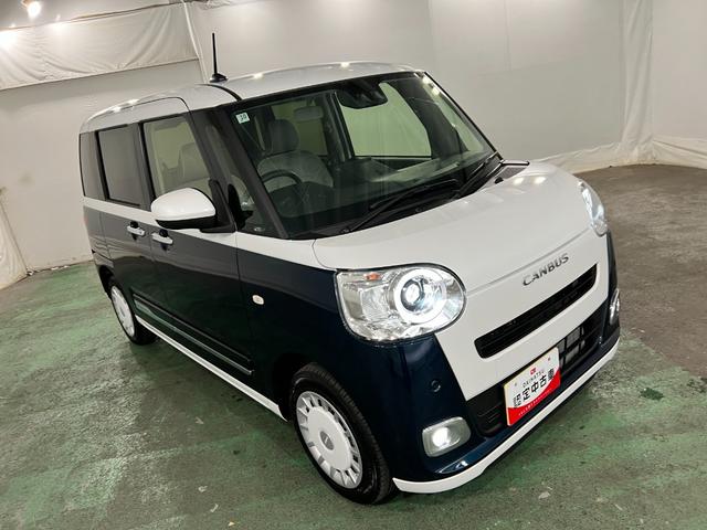 ムーヴキャンバスストライプスGターボ 走行7459キロ/LEDヘッドランプ1年保証距離無制限 走行距離7459キロ 純正マット サイドエアバッグ LEDヘッドランプ アイドリングストップ シートヒーター両側電動スライドドア オート格納式ドアミラー 電動パーキングブレーキ(埼玉県)の中古車