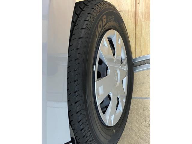 ハイゼットカーゴクルーズ　／４ＷＤ／オーディオレス／キーフリー／オートライトイモビライザー　レーンアシスト　オートマチックハイビーム　キーフリー　オートライト　Ａストップ　Ｗエアバック　４ＷＤ　スマートキー　記録簿　運転席エアバッグ　横滑り防止装置　ＡＢＳ　レーダーブレーキ（富山県）の中古車