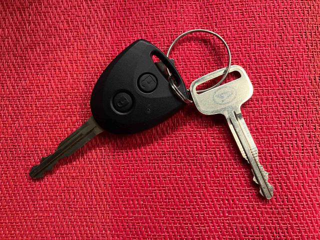 ハイゼットカーゴＤＸ　ワンオーナー走行距離無制限１２ヶ月保証付き　サポカー　禁煙　セキュリティアラーム　両側スライド　助手席エアバック　オートライト　横滑り防止　１オーナー　記録簿　オートマチックハイビーム　ＡＢＳ　運転席エアバッグ（大分県）の中古車