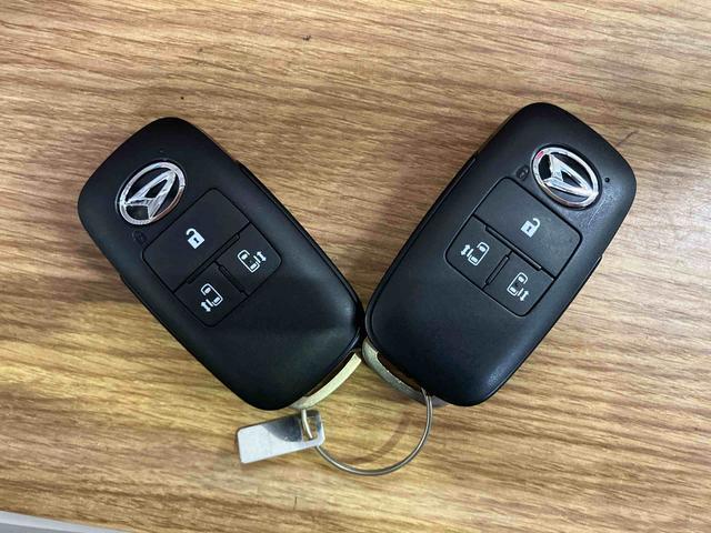 ムーヴキャンバスストライプスG届済未使用車 元展示車 1オーナー 両側電動スライドドア レーンアシスト 電動格納式ドアミラー 衝突安全ボディ アイドリングストップ シートヒーター スマートキー プッシュスタート 車線逸脱警告 禁煙(長崎県)の中古車