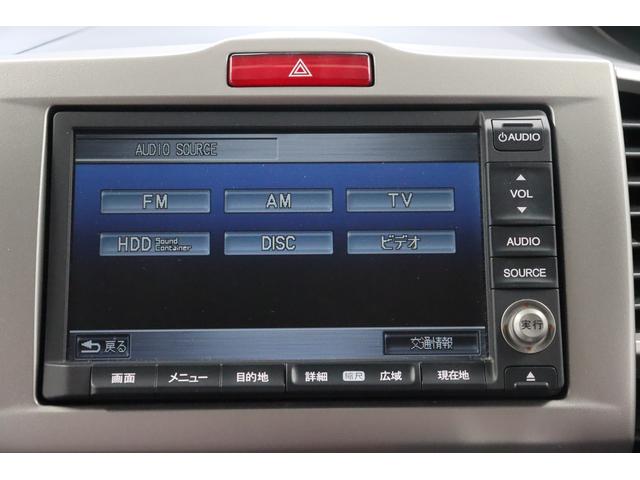 フリードハイブリッドジャストセレクション運転席エアバック　オートライト　Ｂｌｕｅｔｏｏｔｈ接続　ＨＤＤナビ　ＤＶＤ再生　イモビライザー　フルセグＴＶ　スマートキー　横滑防止装置　キーレスエントリーシステム　ＥＴＣ車載器　ＡＢＳ　後席モニター（長崎県）の中古車