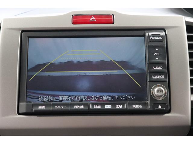 フリードハイブリッドジャストセレクション運転席エアバック　オートライト　Ｂｌｕｅｔｏｏｔｈ接続　ＨＤＤナビ　ＤＶＤ再生　イモビライザー　フルセグＴＶ　スマートキー　横滑防止装置　キーレスエントリーシステム　ＥＴＣ車載器　ＡＢＳ　後席モニター（長崎県）の中古車