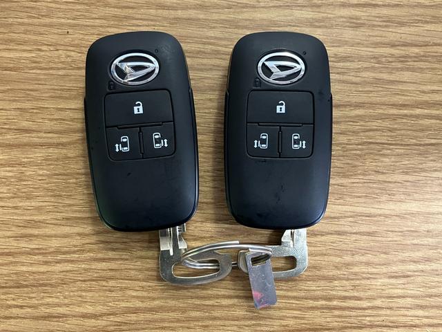 ムーヴキャンバスストライプスＧひょう害車　届出済未使用車　展示車　両側パワードア　スマートキー　軽減ブレーキ　禁煙　セキュリティ　電格ミラー　ＬＥＤライト　レーンキープ　フロントベンチシート　シ−トヒ−タ−（長崎県）の中古車