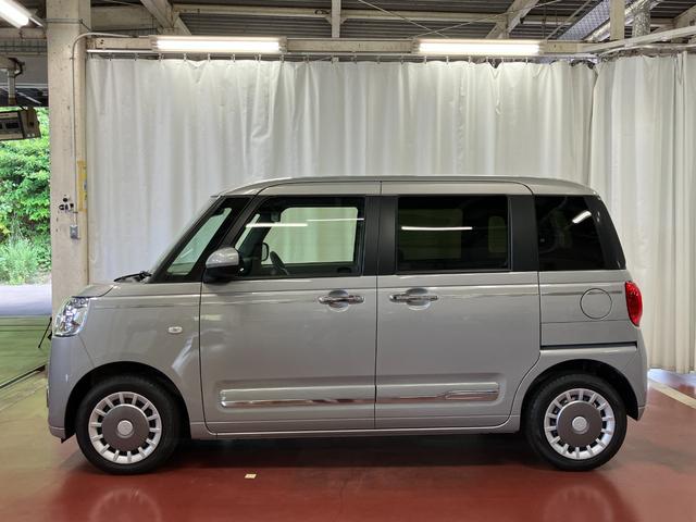 ムーヴキャンバスセオリーＧひょう害車　届出済未使用車　元展示車　アイドリングストップ　衝突被害軽減システム　電動格納ミラー　ＬＥＤヘッドランプ　シートヒーター　両側電動スライドドア　オートライト　ベンチシート　イモビライザー（長崎県）の中古車