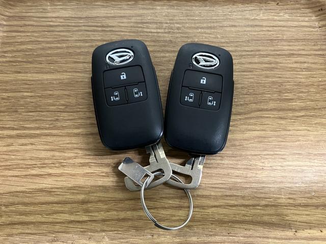 ムーヴキャンバスセオリーG元展示車 届済未使用車 ワンオーナー 禁煙車 電動パーキングブレーキ 両側電動スライドドア シートヒーター 電動格納ミラー 衝突安全ボディ レーンアシスト オートライト スマートキー プッシュスタート(長崎県)の中古車