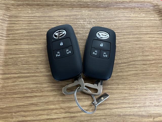 ムーヴキャンバスストライプスＧ元展示車　届出済未使用車　１オーナー　禁煙車　両側電動スライドドア　シートヒーター　電動格納式ドアミラー　衝突安全ボディ　アイドリングストップ　スマートキー　ＬＥＤヘッドランプ　オートライト（長崎県）の中古車