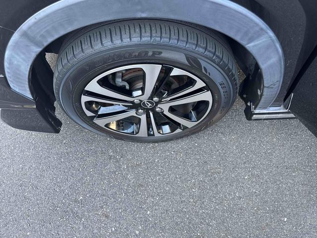 ロッキープレミアムプッシュスタートスイッチ 電子カードキー 衝突軽減システム 車線逸脱警報 アルミホイール ABS ナビゲーション リアシートモニター(鹿児島県)の中古車