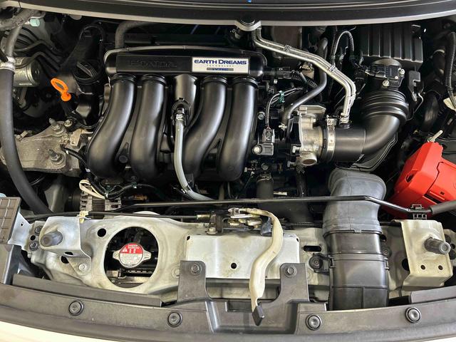 フリードＧ・ホンダセンシング４ＷＤ　オートライト／エアコン　純正ナビ　バックカメラ　ステアリングスイッチ　クルーズコントロール　ＥＣＴ　運転席・助手席シートヒータースイッチ　両側パワースライドドア　純正リモコンエンスタ（秋田県）の中古車