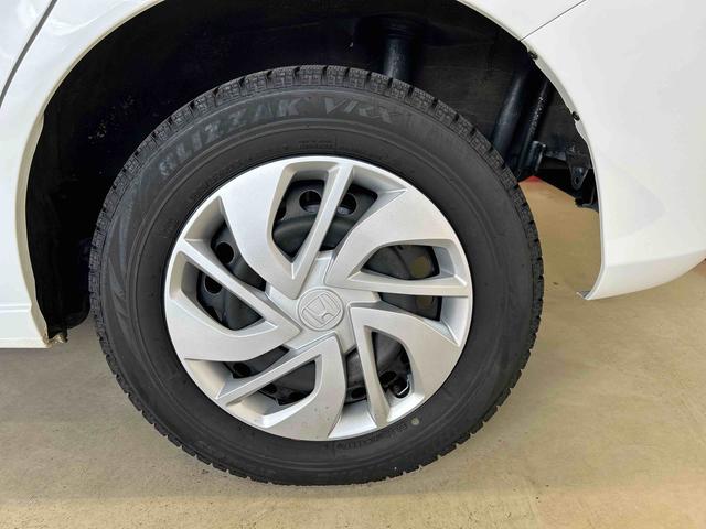 フリードＧ・ホンダセンシング４ＷＤ　オートライト／エアコン　純正ナビ　バックカメラ　ステアリングスイッチ　クルーズコントロール　ＥＣＴ　運転席・助手席シートヒータースイッチ　両側パワースライドドア　純正リモコンエンスタ（秋田県）の中古車